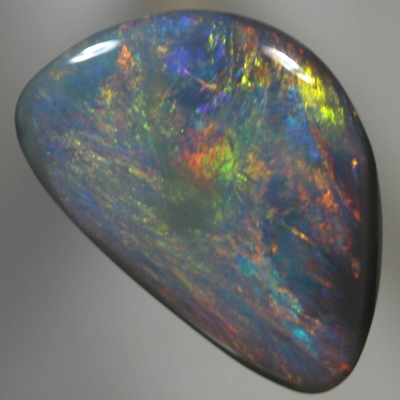 SOLID BLACK OPAL Golden fire, red, copper and green over blue purple
